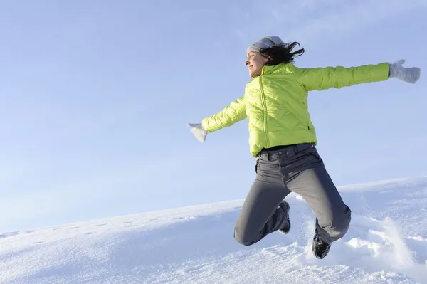 Happy young girl jumping — Stock Photo, Image