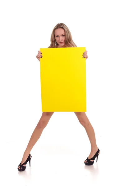 Woman hold yellow rectangle — Stock Photo, Image