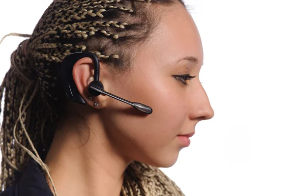 Woman with bluetooth hands-free headset — Stock Photo, Image