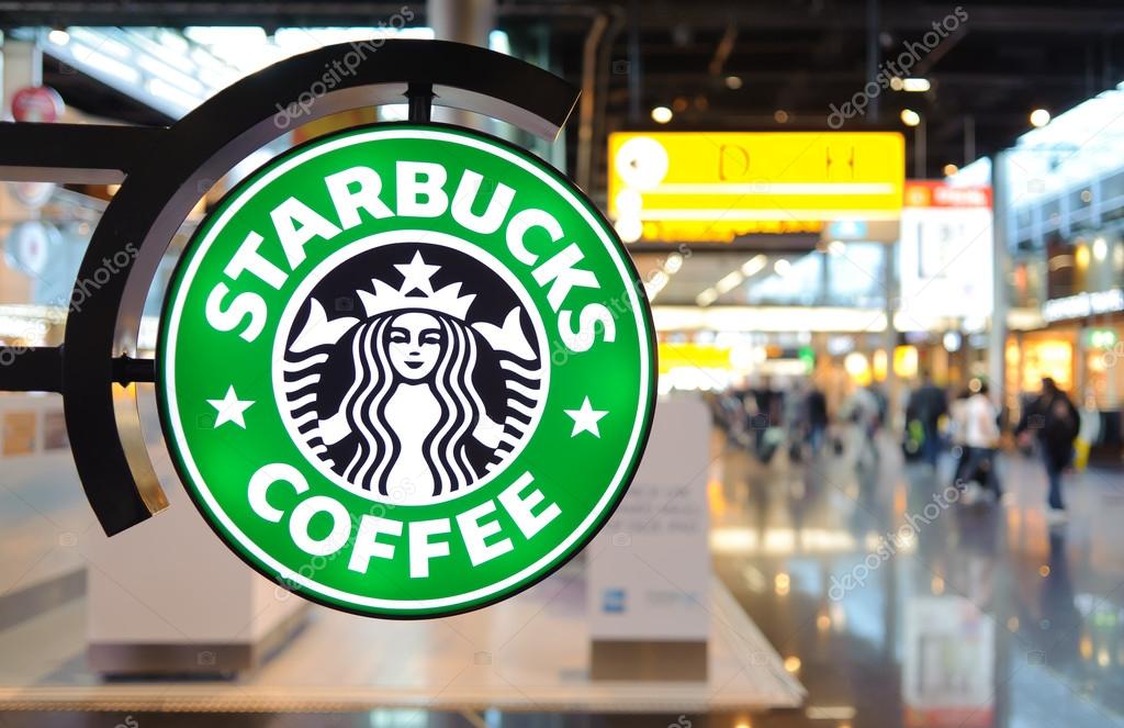 Amsterdam, Netherlands - JUNE 08, 2011: Starbucks coffee logo in Amsterdam Airport Schiphol on June 08, 2011 in Netherlands. Starbucks Corporation is an American global coffee company and coffeehouse chain based in Seattle, Washington