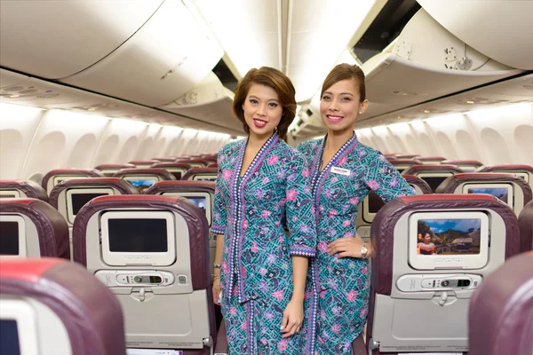 Члены экипажа Malaysia Airline — стоковое фото