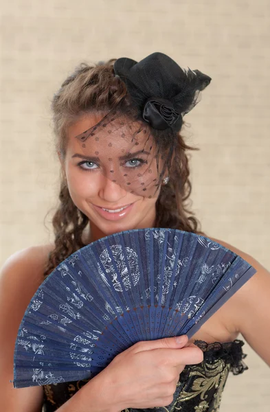 Retrato com um ventilador — Fotografia de Stock