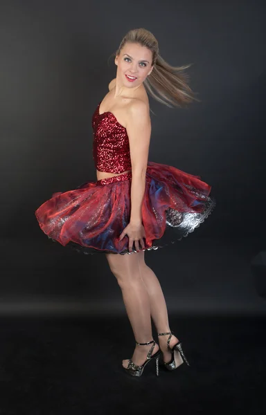 Girl in a red dress — Stock Photo, Image