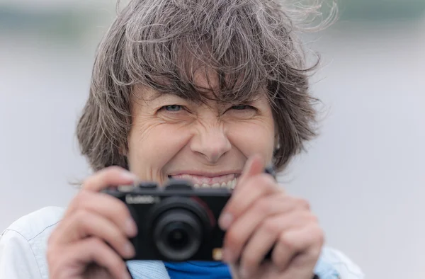 Cheerful photographer — Stock Photo, Image