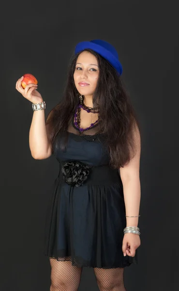 Girl with an apple — Stock Photo, Image