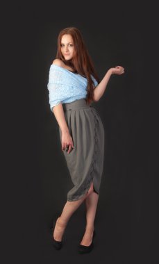 slim girl on a black background