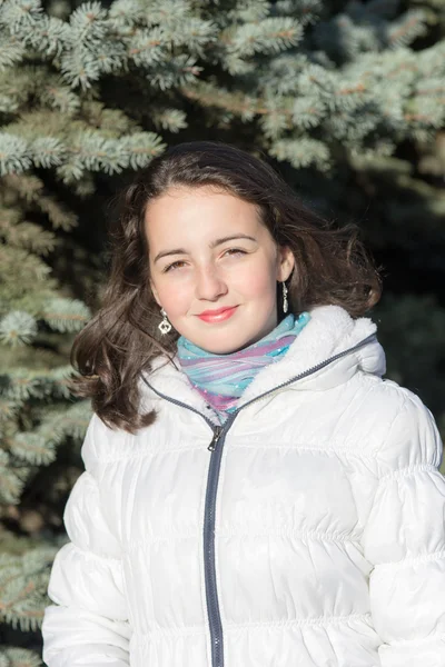 Girl in a white jacket — Stock Photo, Image