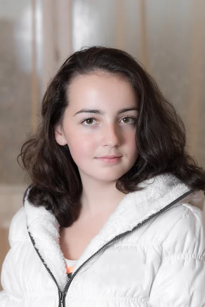 Girl in a white jacket — Stock Photo, Image