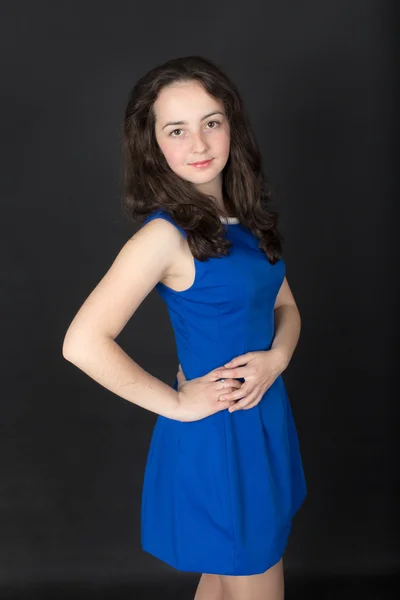 Girl in a blue dress — Stock Photo, Image