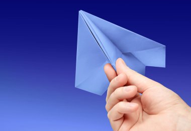 Paper plane in hand clipart