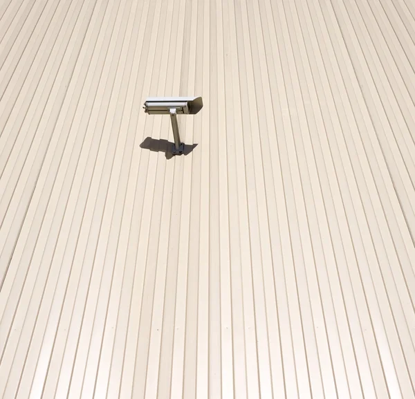 Surveillance camera on wall — Stock Photo, Image