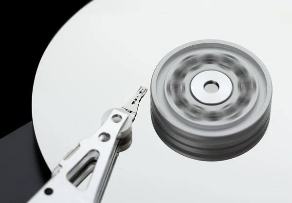 Hard disk drive rotates at high speed — Stock Photo, Image