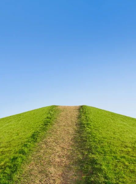 Sentiero sulla collina contro il cielo. Sviluppo o cura di simboli — Foto Stock