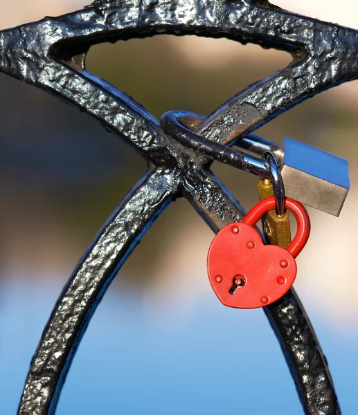 Red lock in the shape of a heart — Stock Photo, Image