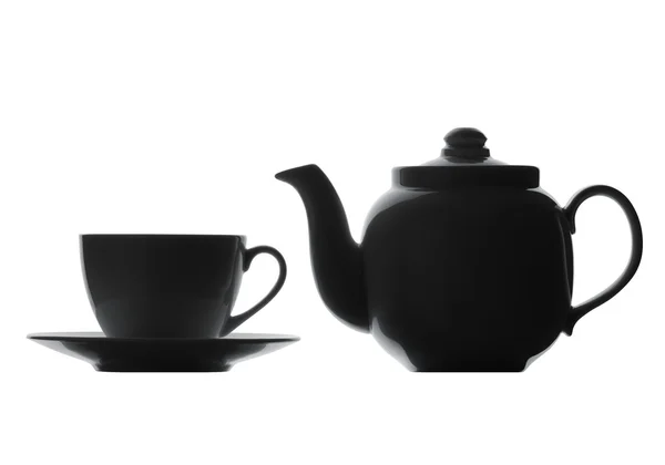 Teekanne und Tasse vorhanden. Silhouette auf weißem Hintergrund — Stockfoto
