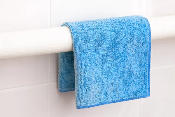 Towel onto the coil in the bathroom — Stock Photo, Image