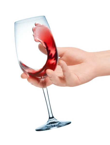 Glass of red wine in hand — Stock Photo, Image