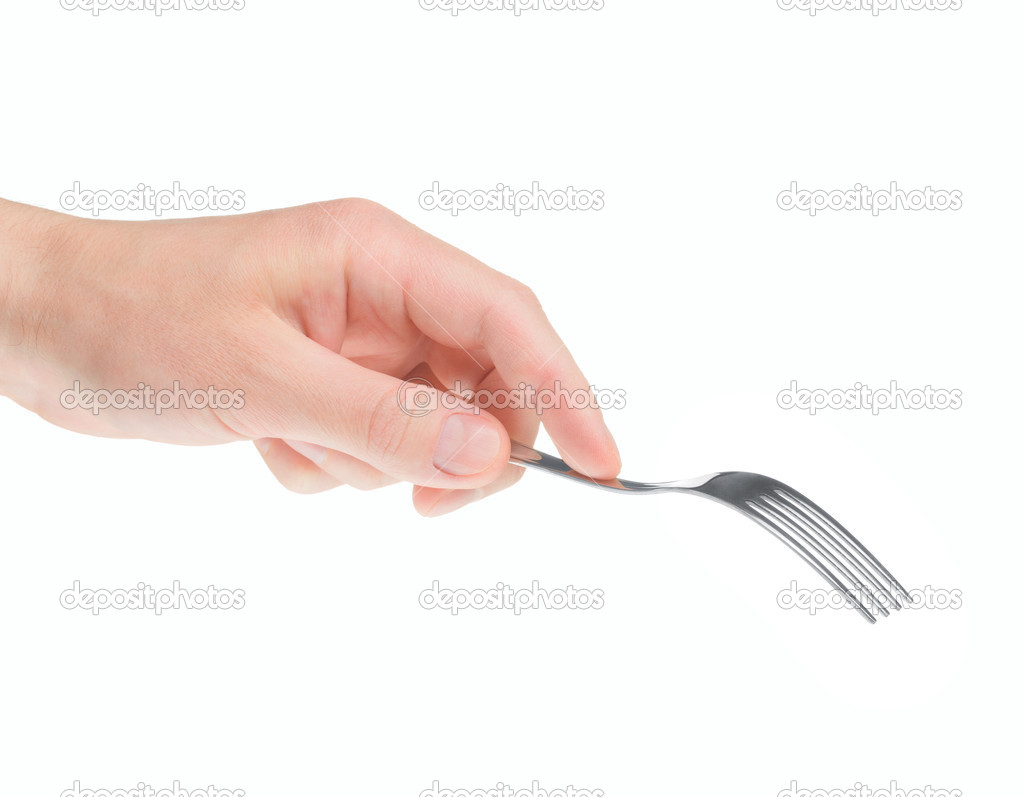 Fork in hand on white background