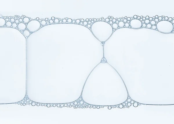 Bubblor som bildats på ytan av vattnet ett intrikat mönster — Stockfoto