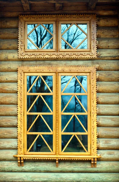 Wooden window on the log wall — Stock Photo, Image
