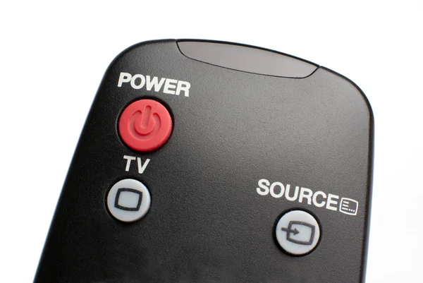 Black remote control on white background — Stock Photo, Image