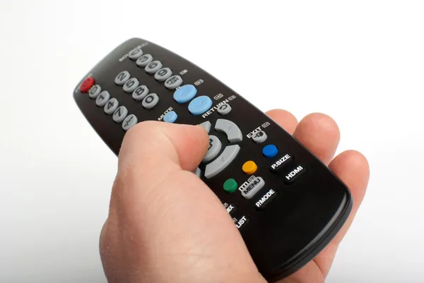 Black remote control on white background — Stock Photo, Image