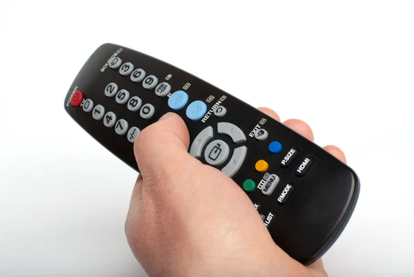 Black remote control on white background — Stock Photo, Image