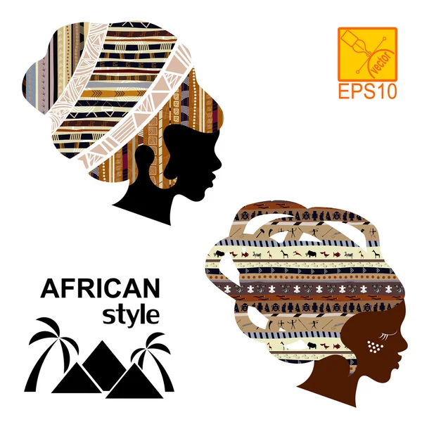 Silhouettes of the head of an  African girls — Stock Vector