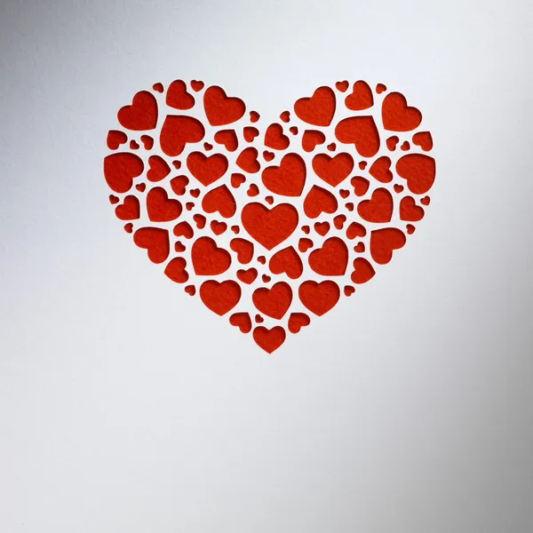 Valentine day heart made of small hearts on paper card — Stock Photo, Image