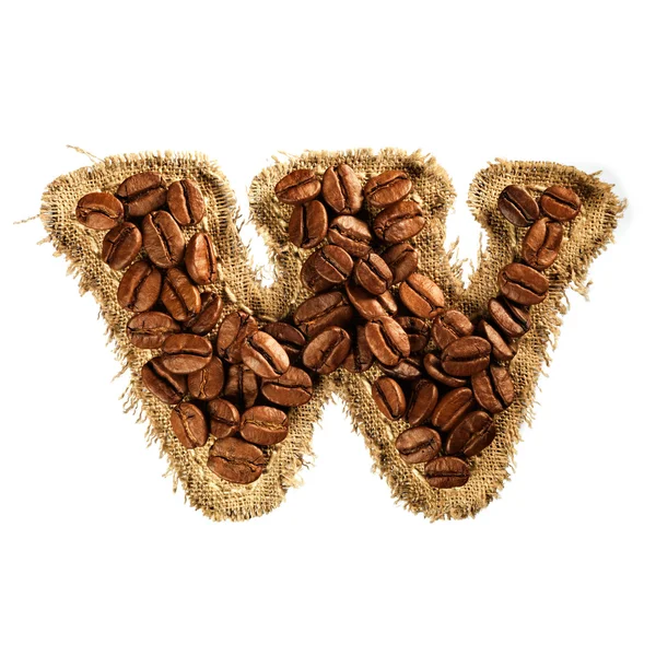 Alphabet from coffee beans on fabric texture isolated on white — Stock Photo, Image