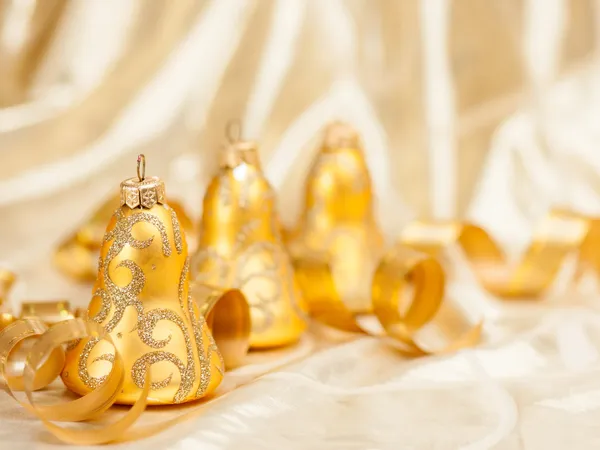 Kerstmis achtergrond van intreepupil gouden lichten. — Stockfoto