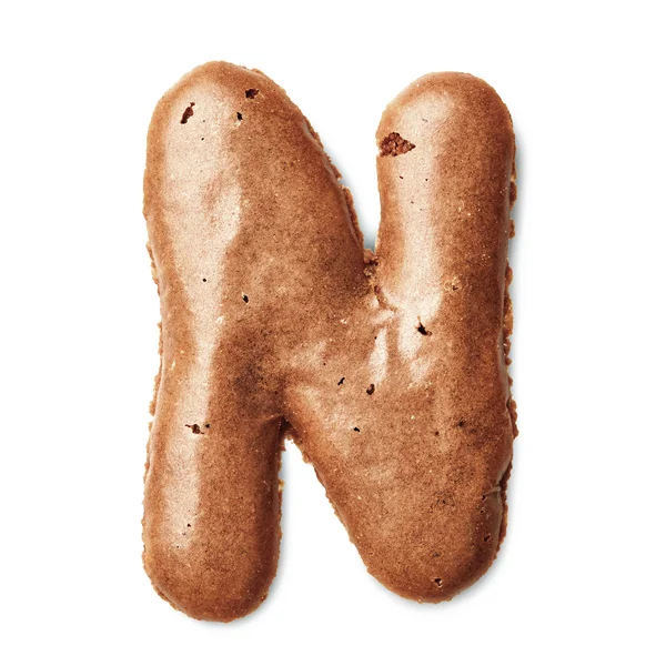 Letters made of caramel cookies — Stock Photo, Image