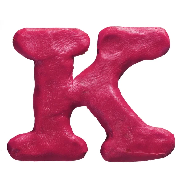 Plasticine red letter K isolated on a white background — Stock Photo, Image