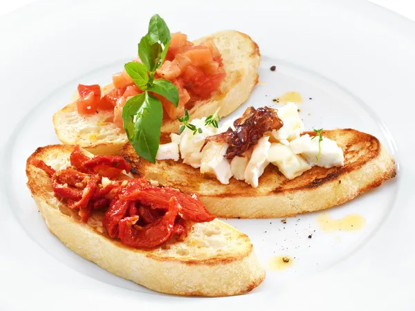 Assorted bruschetta with salmon — Stock Photo, Image