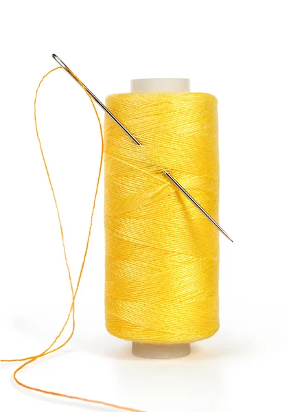 Bobbin thread with needle isolated on white — Stock Photo, Image