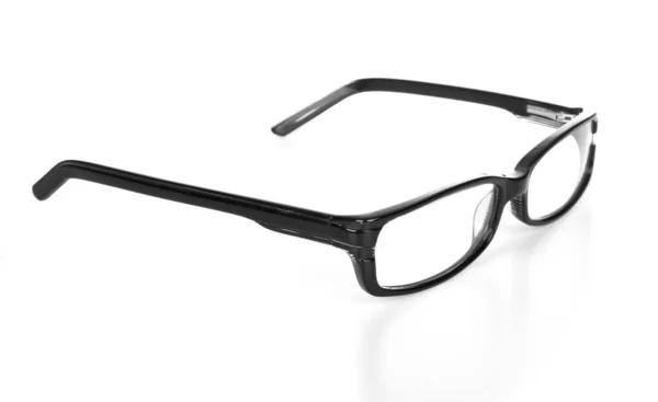 Moldura de óculos pretos em um fundo branco — Fotografia de Stock