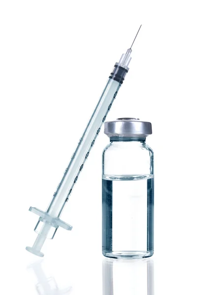 Medical ampules and syringe — Stock Photo, Image