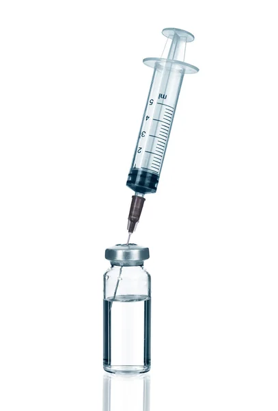 Medical ampules and syringe — Stock Photo, Image