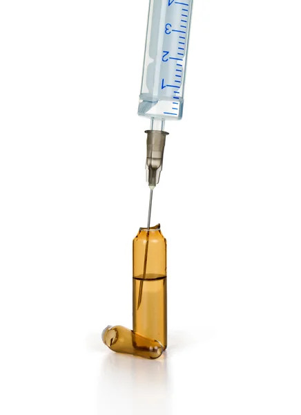 Medical ampoule and syringe isolated on white — Stock Photo, Image