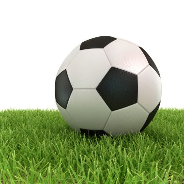 Yeşil çimlerde futbol topu