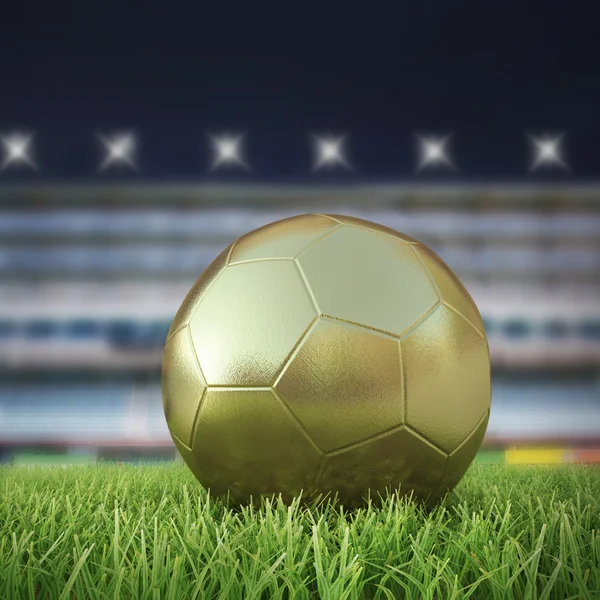 Golden Soccerball 3D auf dem Spielfeld bei schönem Sonnenuntergang — Stockfoto