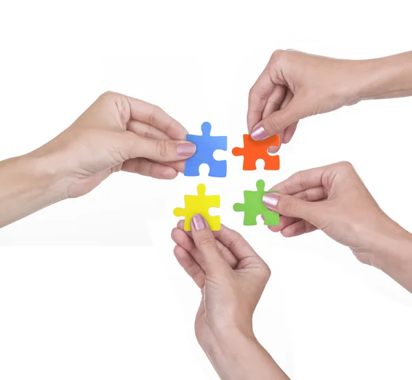 Hands and puzzle — Stock Photo, Image