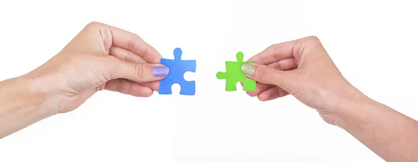 Hands and puzzle — Stock Photo, Image