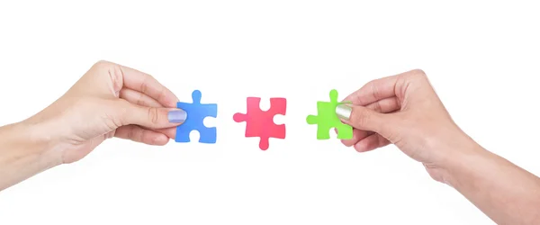 Mani e puzzle — Foto Stock