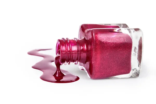 Bottles with spilled nail polish — Stock Photo, Image
