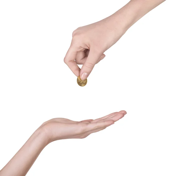 手に注ぐコイン — ストック写真
