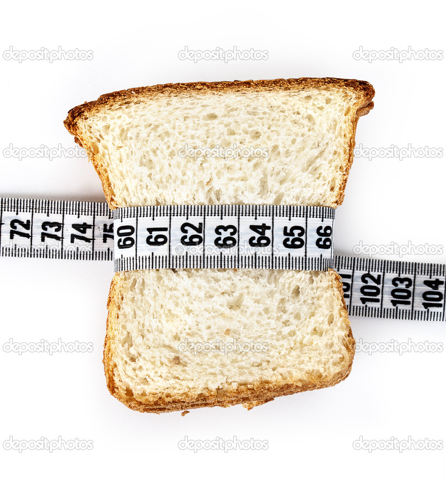 Piece of bread grasped by measuring tape