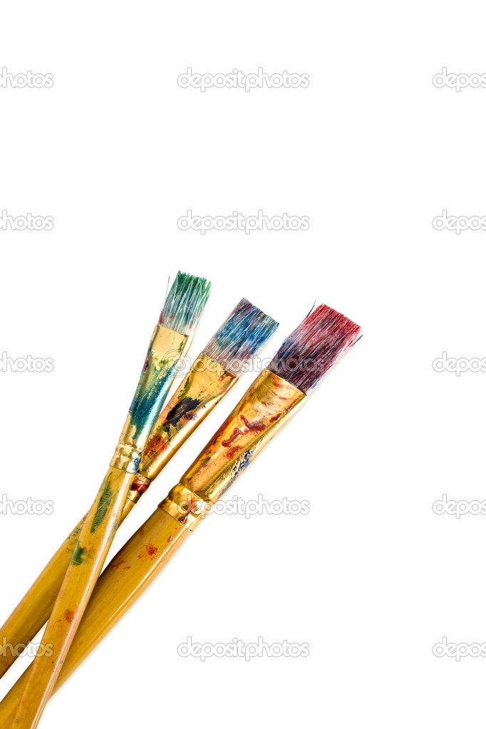 Paint brushes and paint, isolated on a white