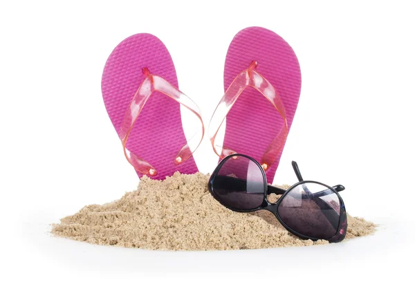 Flip-flops on a sunny pile of sand — Stock Photo, Image