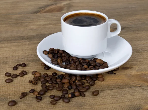 Tasse de café et graines de café — Photo